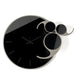 Vista frontale dell'orologio in vetro specchio Crystal® nero Apostrofo con  indici e decori in cristallo acrilico nero specchiato. Base in ferro fango. Prodotto da Arti&Mestieri.