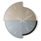 Orologio da parete Avignone 90 di grande formato con doppio quadrante in vetro specchiato Crystal Luxe® nelle raffinate tonalità bronzo e fumé. Vista frontale