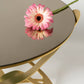 Particolare del tavolino Ninfa con piano in specchio bronzo.