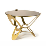 Tavolino Ninfa con piano in specchio bronzo. Vista di trequarti.