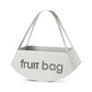 Vista di tre quarti del centro tavola Fruit Bag finitura bianco marmo di Arti&Mestieri.